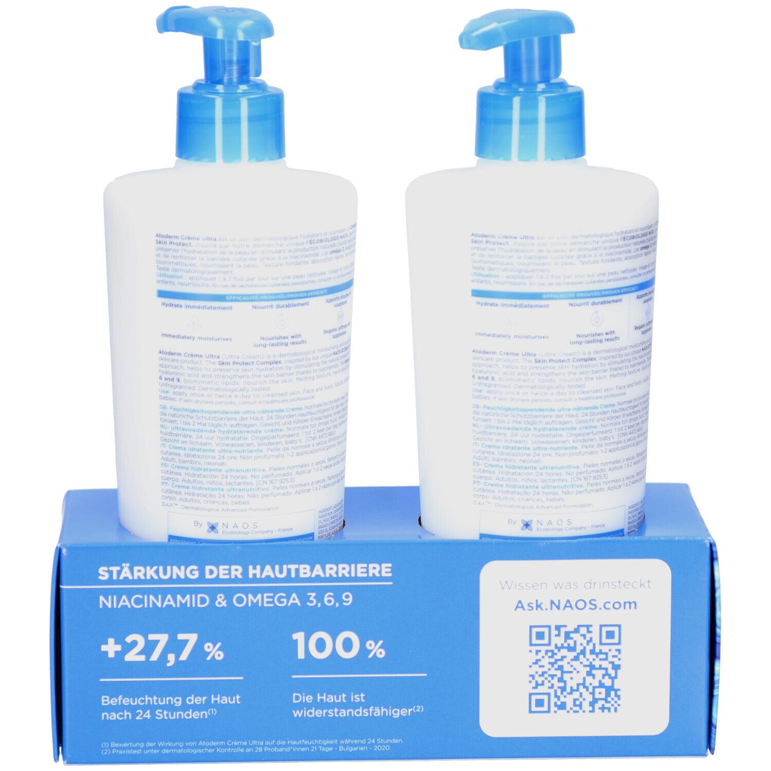 Rückansicht von zwei weißen BIODERMA Atoderm Creme Ultra Flaschen mit blauen Pumpköpfen. Auf blauem Karton mit Text.