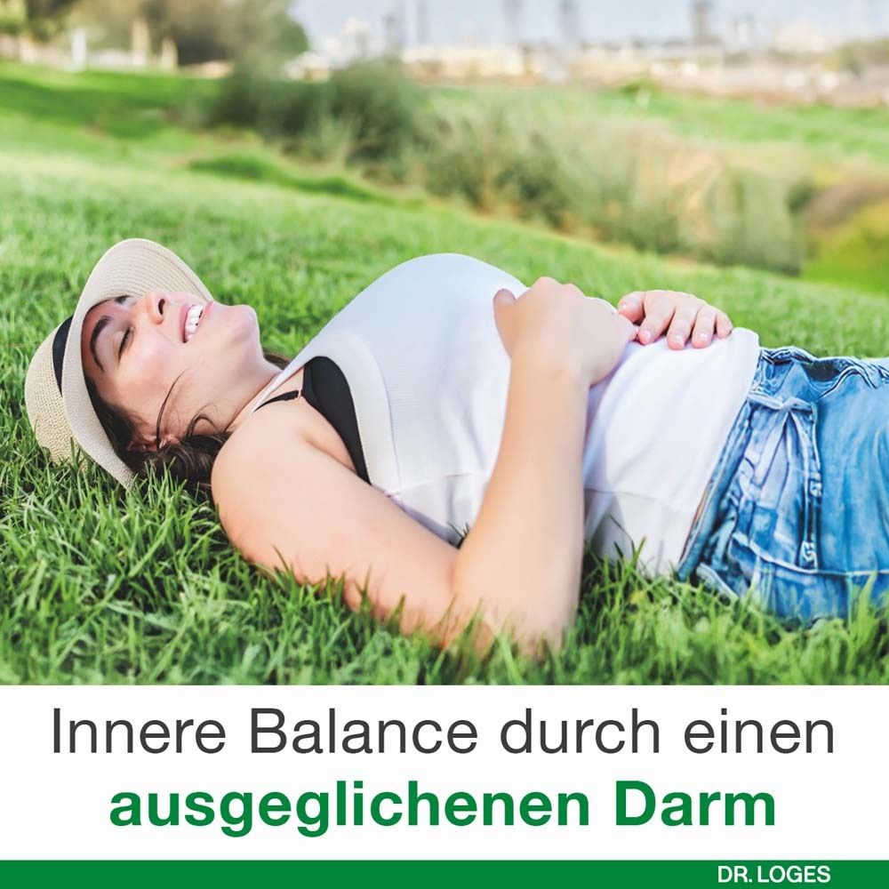 Frau liegt auf Wiese. Text: Innere Balance durch einen ausgeglichenen Darm. Dr. Loges Logo.