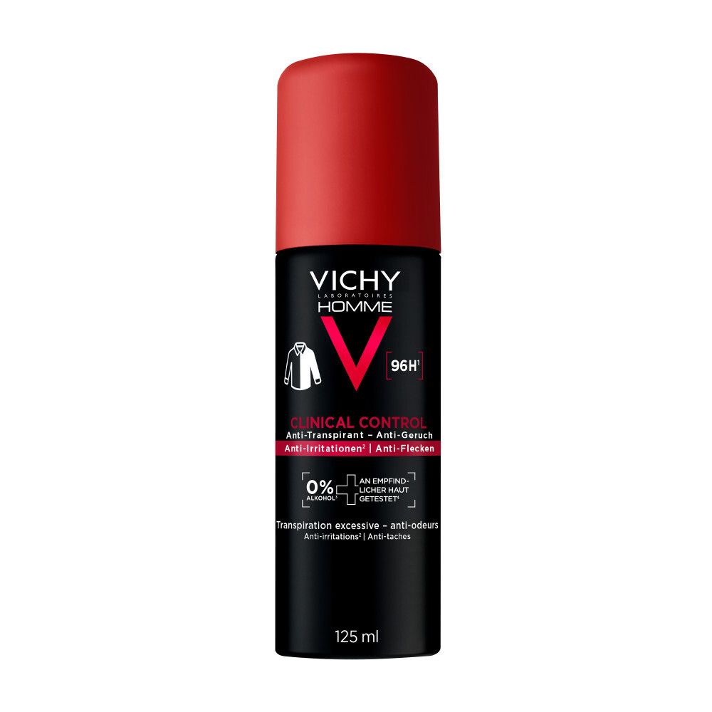 Mann sprüht Achselhöhle mit Vichy Homme Deo Spray ein. Roter Hintergrund. Text: 4 Tage langanhaltender Schutz.