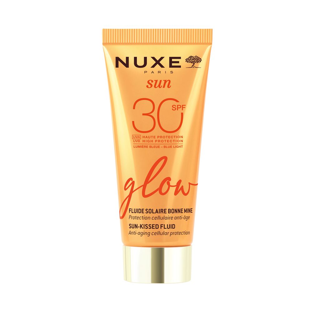 NUXE Sun Sonnenfluid Glow LSF 30. Tube mit goldener Kappe. Text: SPF 30, glow, Fluide Solaire Bonne Mine.