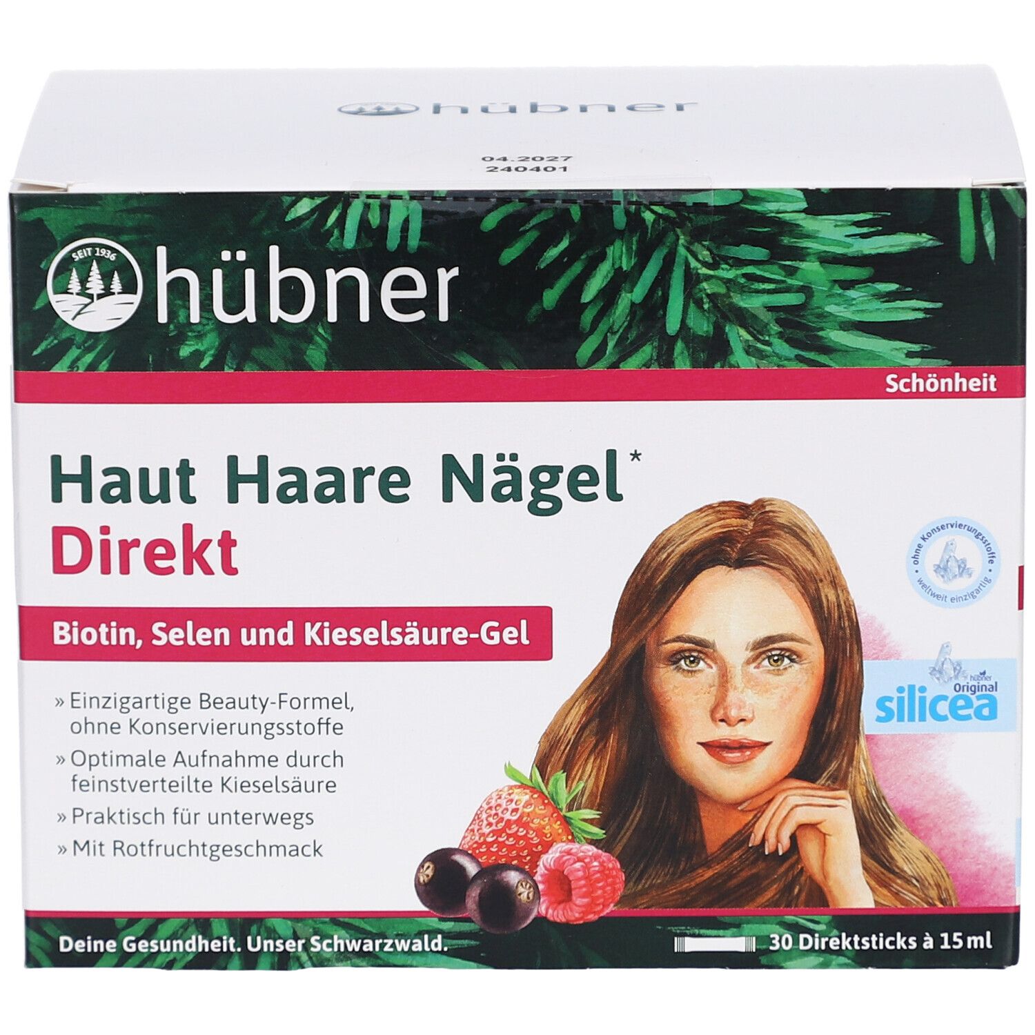 Karton mit Produktaufdruck. Enthält: Haut Haare Nägel Direkt. Abbildung einer Frau, Früchte. Marke: Hübner.