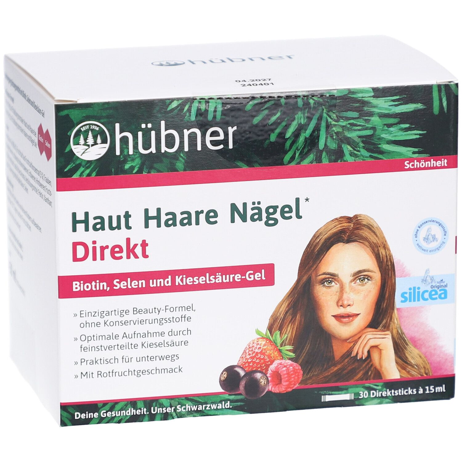 Karton mit Produktaufdruck. Enthält: Haut Haare Nägel Direkt. Abbildung einer Frau, Früchte. Marke: Hübner.