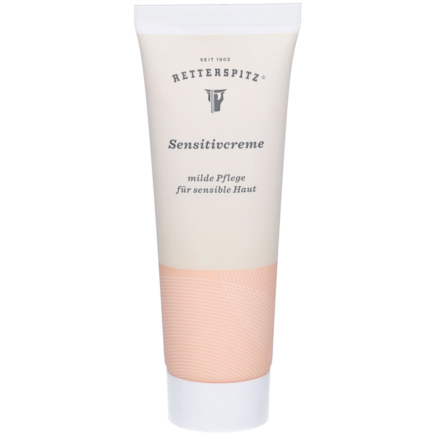 Creme-Tube mit Produktnamen und Logo. Farbgebung: Weiß, Beige und Rosa. Aufschrift: Sensitivcreme, milde Pflege für sensible Haut.