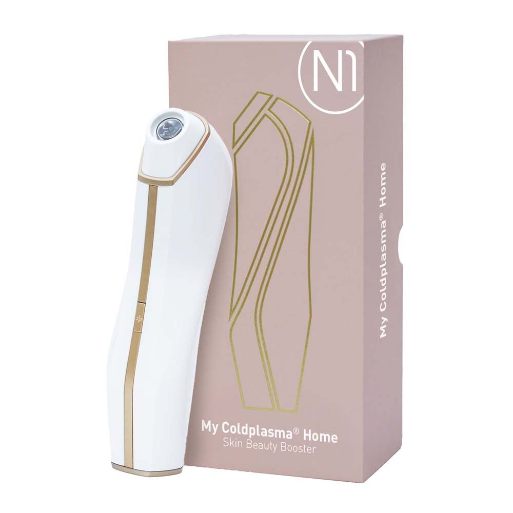 Weißes Gerät mit goldfarbenen Akzenten und rosa Verpackung. Auf der Verpackung steht "N1 My Coldplasma Home Skin Beauty Booster".