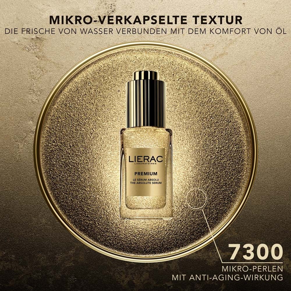 Serumflasche auf goldenem Hintergrund. Text: MIKRO-VERKAPSELTE TEXTUR. 7300 Mikro-Perlen mit Anti-Aging-Wirkung.