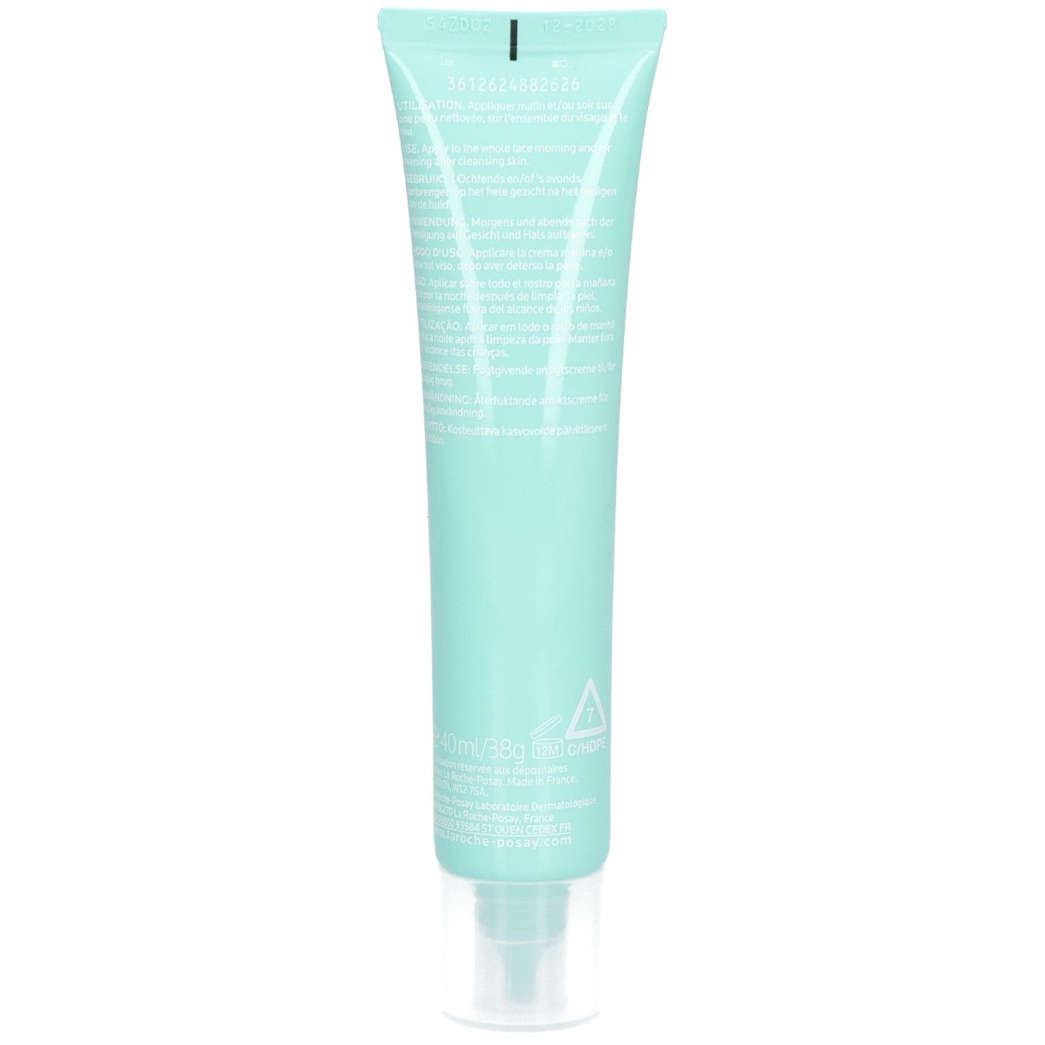 Rückseite einer hellgrünen Tube. Text in kleiner Schrift. Transparenter Verschluss. Unten links ein Dreieck-Symbol.