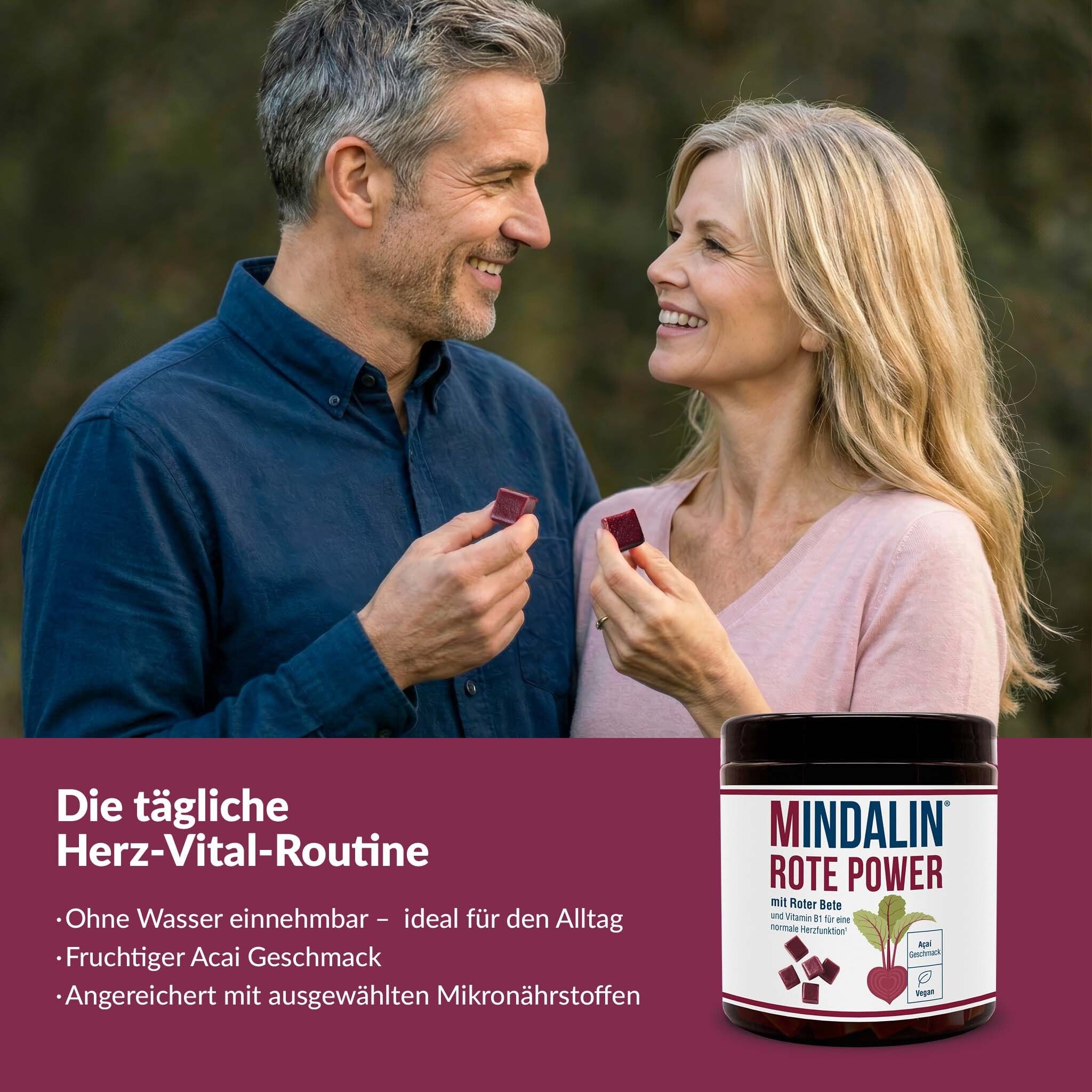 Paar hält Kautabletten. Dose mit Aufschrift: MINDALIN ROTE POWER. Text: Die tägliche Herz-Vital-Routine.