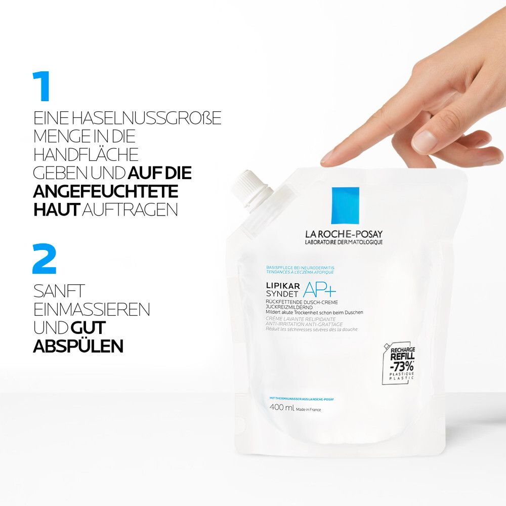 Anleitung: 1. Haselnussgroße Menge auftragen. 2. Sanft einmassieren und abspülen. Nachfüllpackung im Hintergrund.