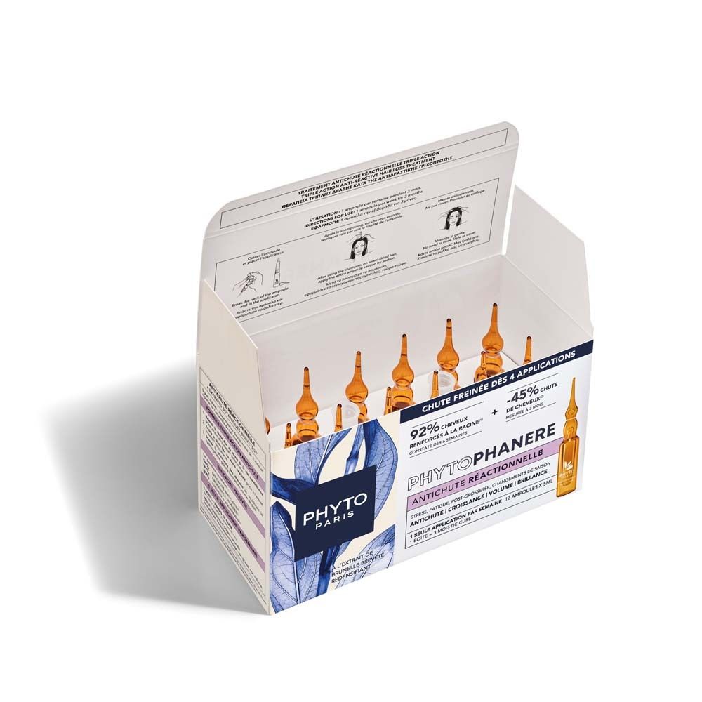 Geöffnete Verpackung mit Phytophanere Ampullen. 12 Ampullen sichtbar. Aufschrift: Phytophanere, reaktiver Haarausfall. Angaben zur Anwendung.