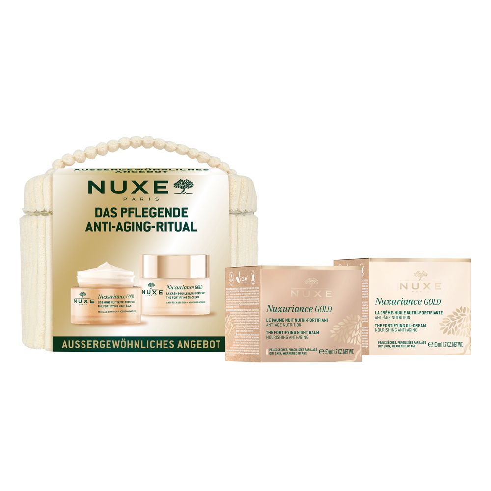 NUXE Set. Cremes und Balsam in Verpackung. Beige Kosmetiktasche mit Griff. Nuxuriance Gold Anti-Age Ritual.