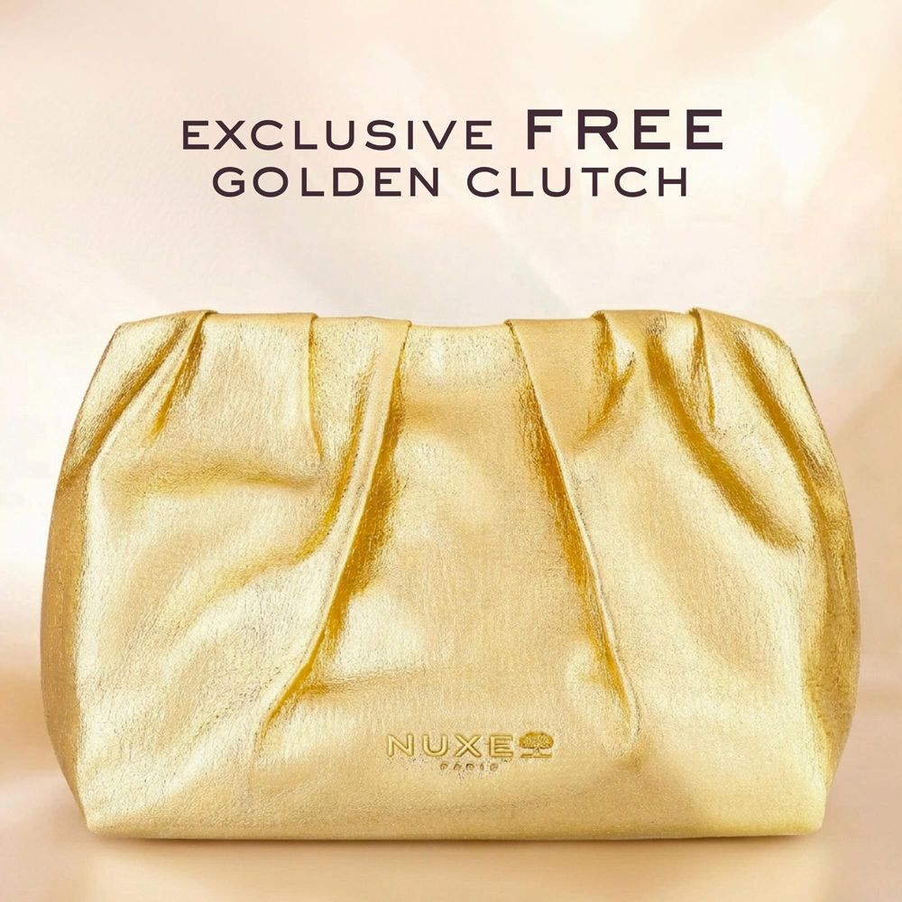 Goldene Clutch mit Raffungen und Nuxe Paris Logo.
