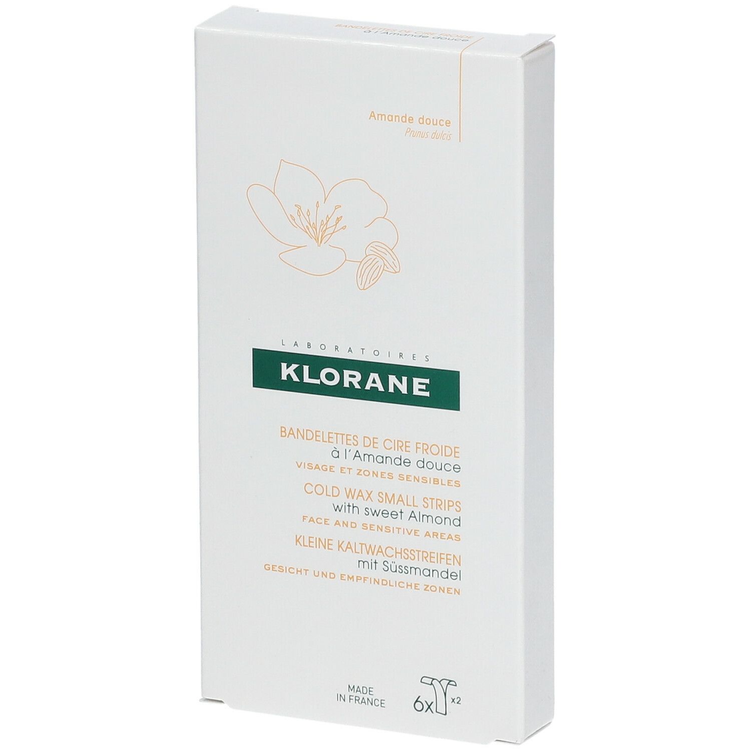 Klorane-Verpackung mit Kaltwachsstreifen für das Gesicht. Aufschrift: Klorane, Mandel, Gesicht, empfindliche Bereiche. 6x2 Streifen.