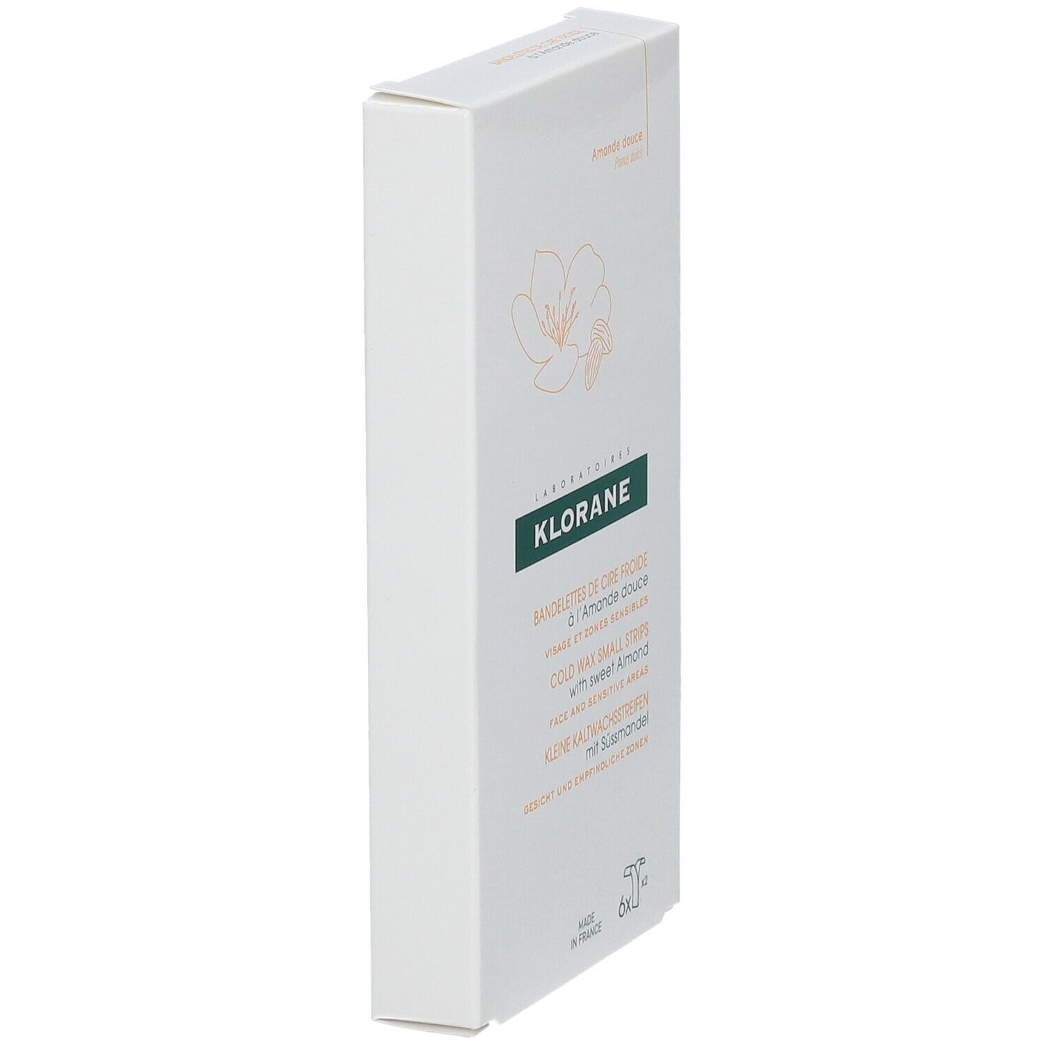 Klorane-Verpackung mit Kaltwachsstreifen für das Gesicht. Aufschrift: Klorane, Mandel, Gesicht, empfindliche Bereiche. Seitenansicht.