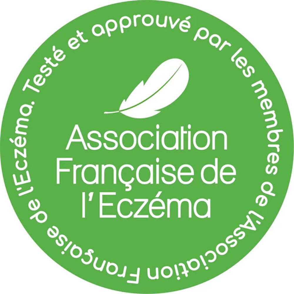 Runder, grüner Aufkleber mit weißer Feder und Text: Association Française de l'Eczéma.