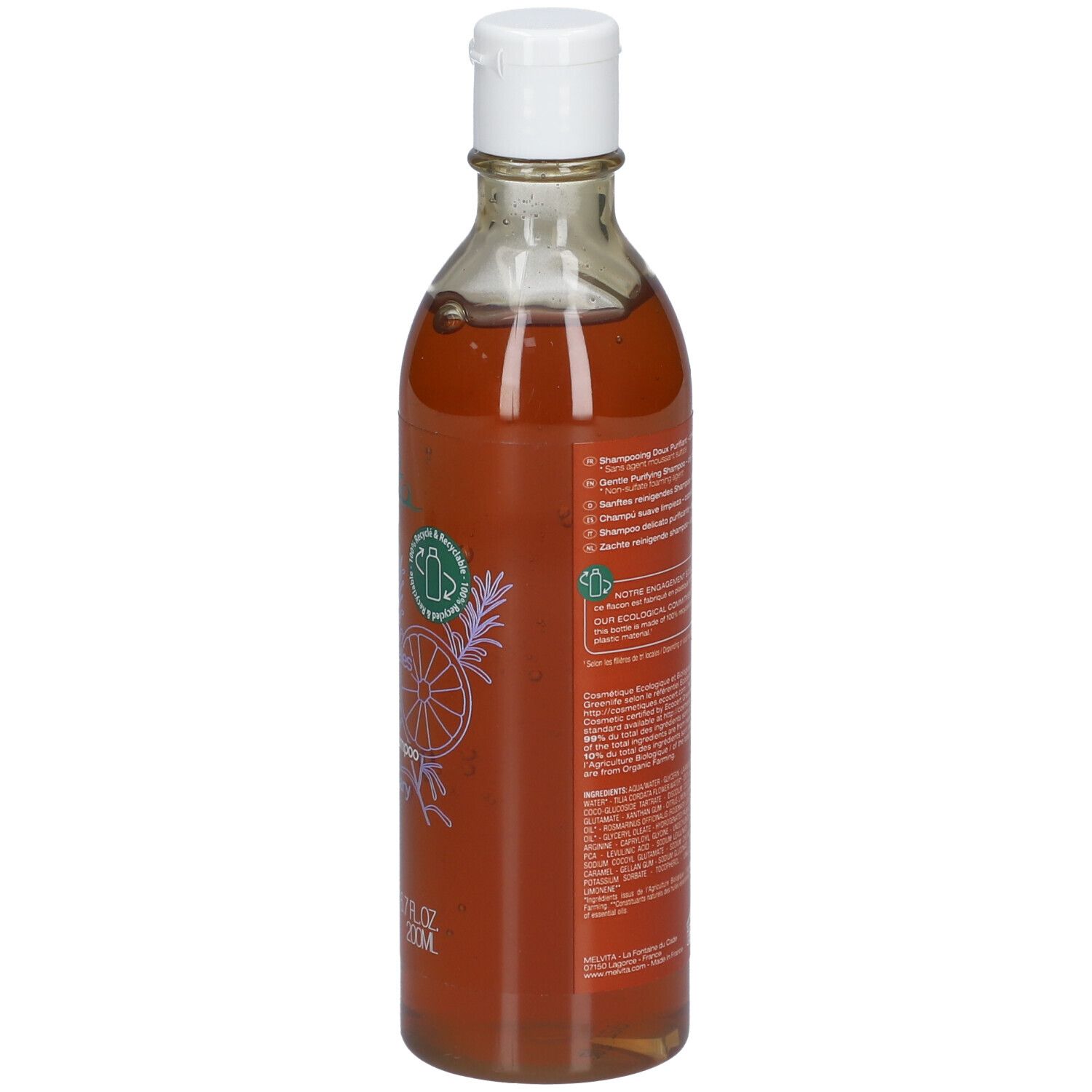 Transparente Flasche mit brauner Flüssigkeit und weißem Deckel. Rückseite mit Text und Logo.