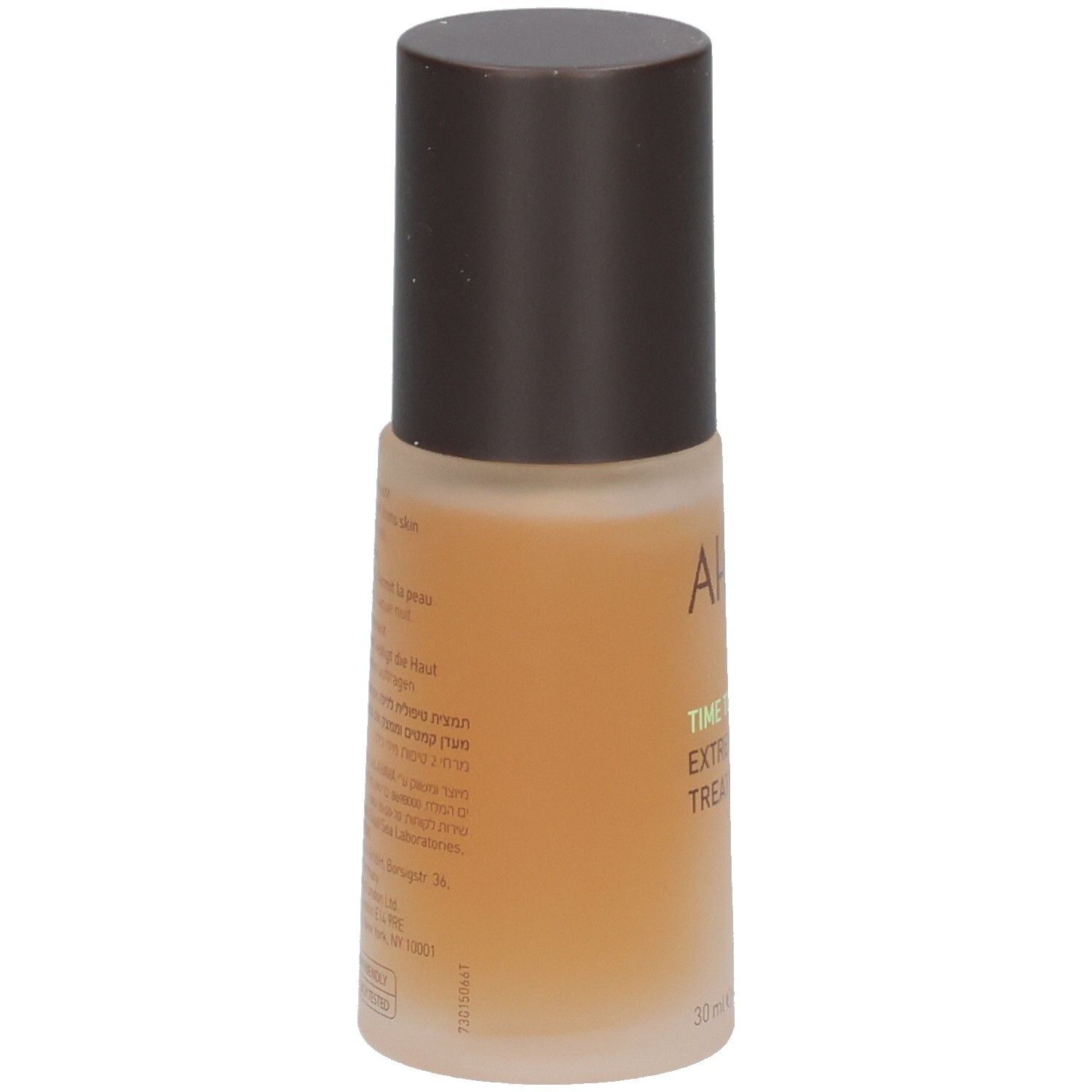 Braune Flasche mit braunem Deckel. Aufschrift AHAVA, TIME TO REVITALIZE, EXTREME NIGHT TREATMENT. Rückseite mit Text.