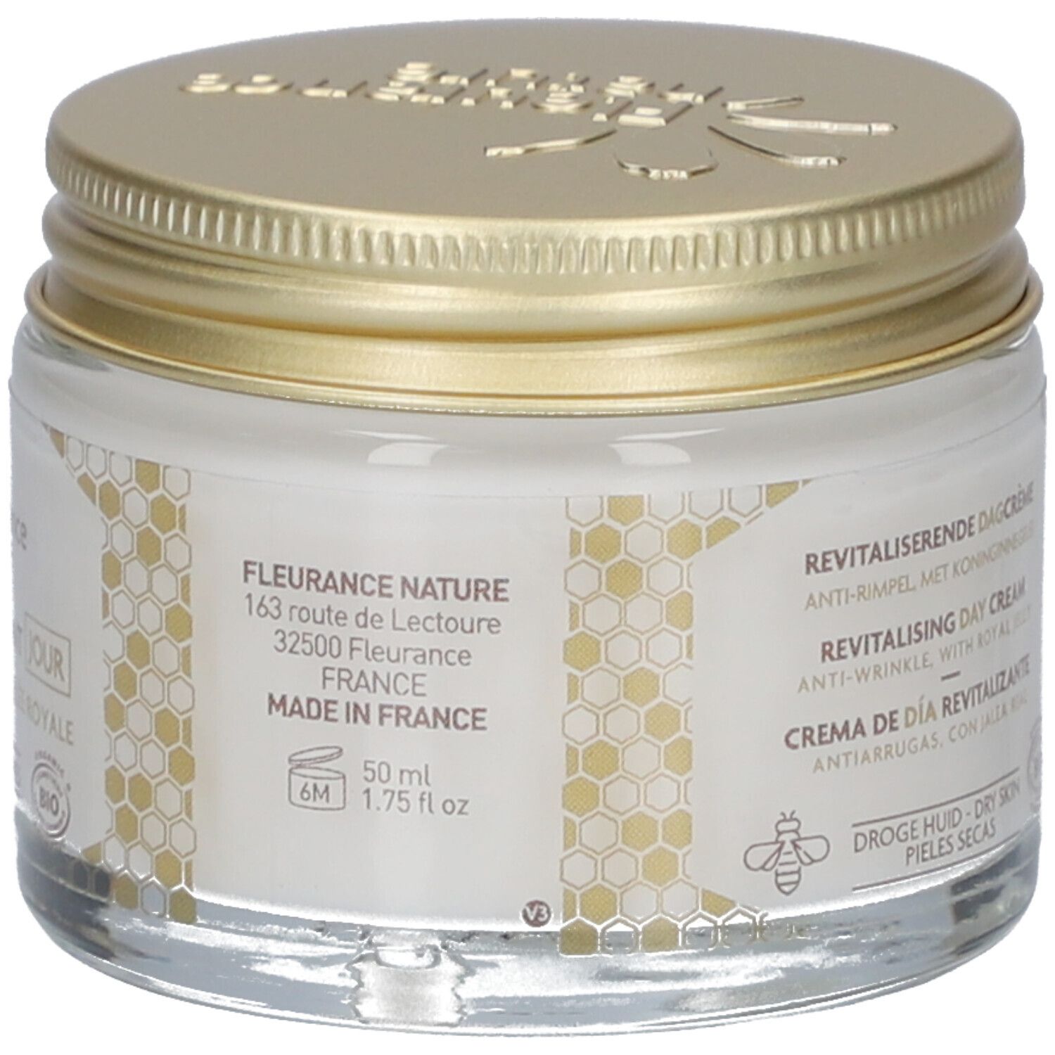 Glas mit goldfarbenem Deckel. Aufschrift: Fleurance Nature, 50 ml, 1.75 fl oz. Adresse und Herkunft. Bio-Siegel. Honigwaben-Design.