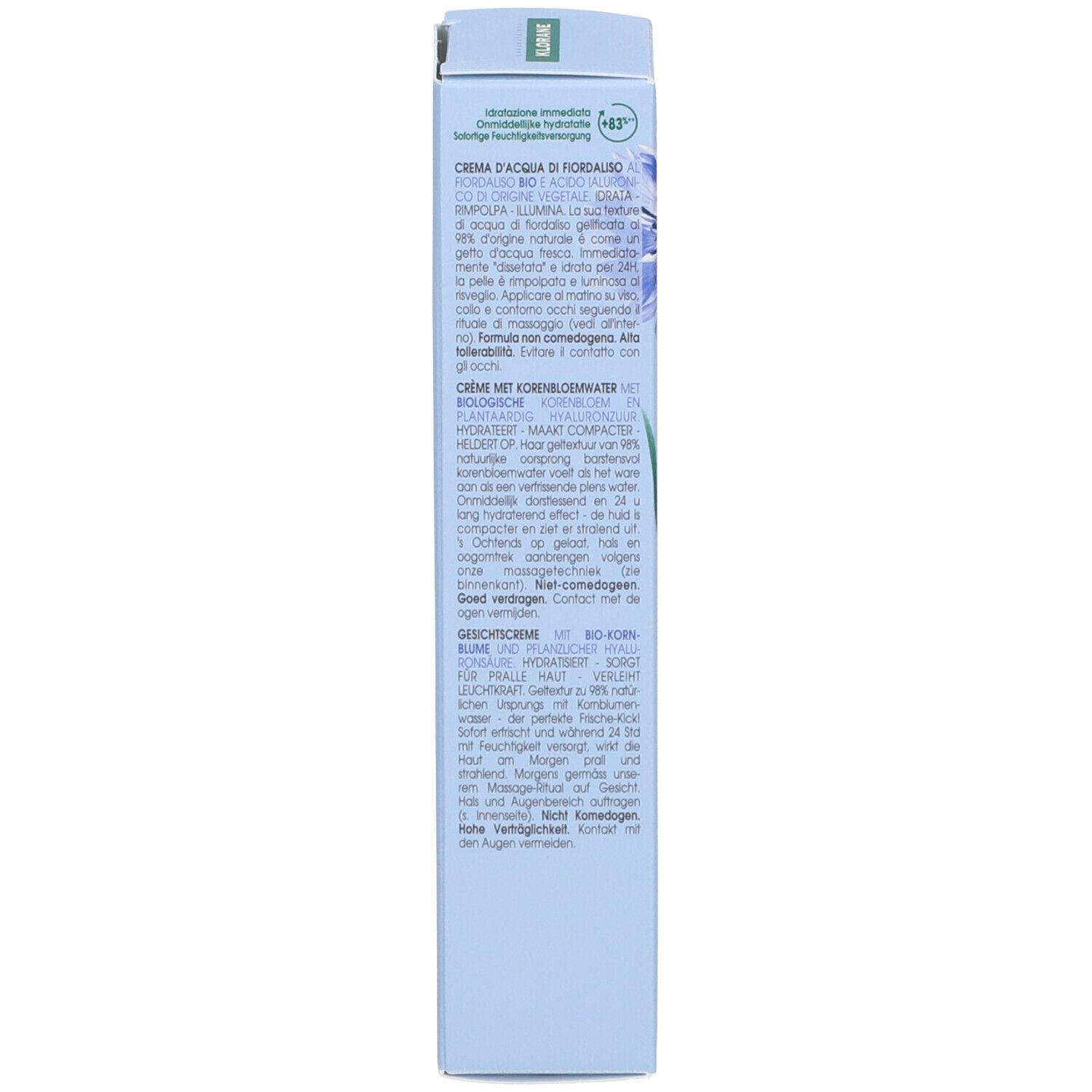 Rückseite der hellblauen Schachtel. Text in mehreren Sprachen. Enthält Informationen über die Creme d'Eau de Bleuet.