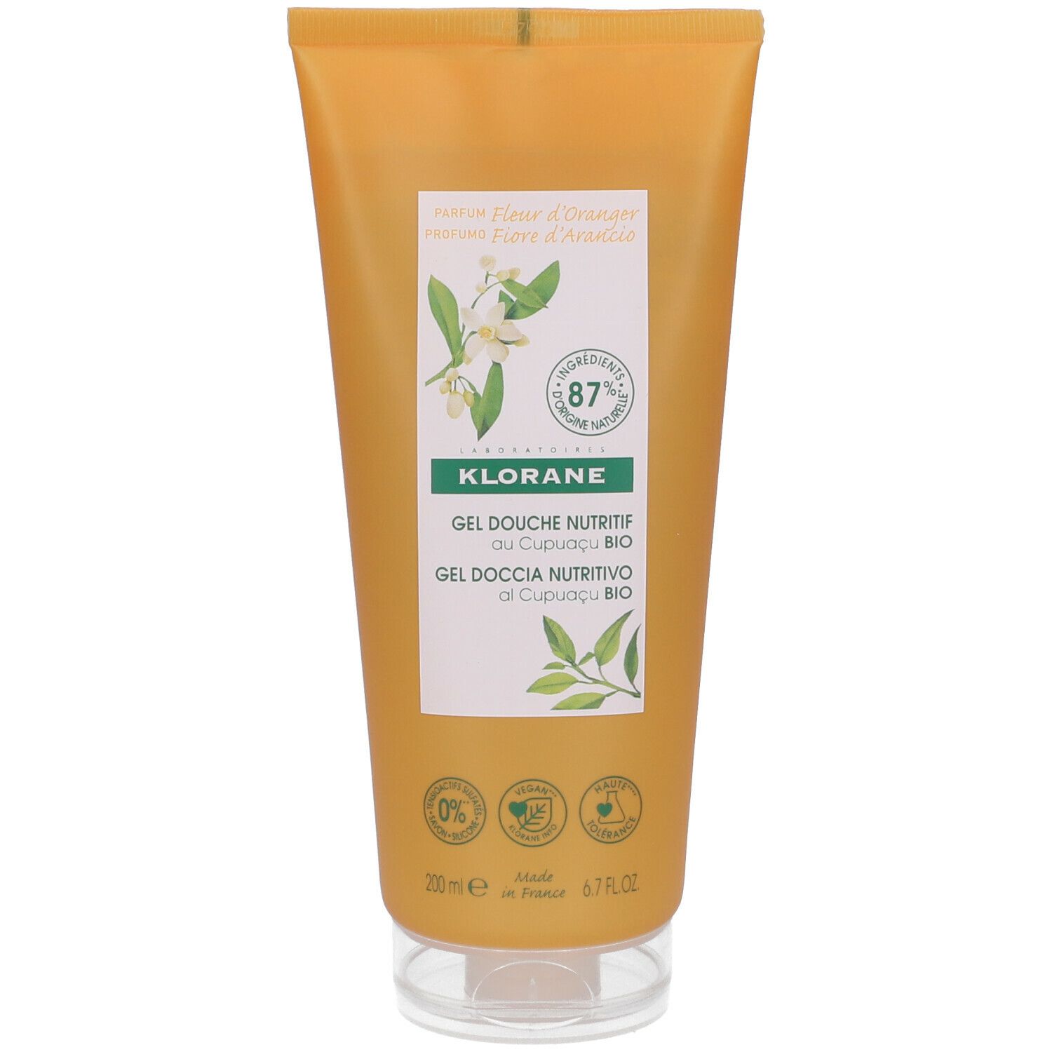 Klorane Duschgel mit Orangenblüten, gelbe Tube. Aufdrucke: Blüten, 87% Inhaltsstoffe natürlichen Ursprungs, Bio-Zertifizierung.