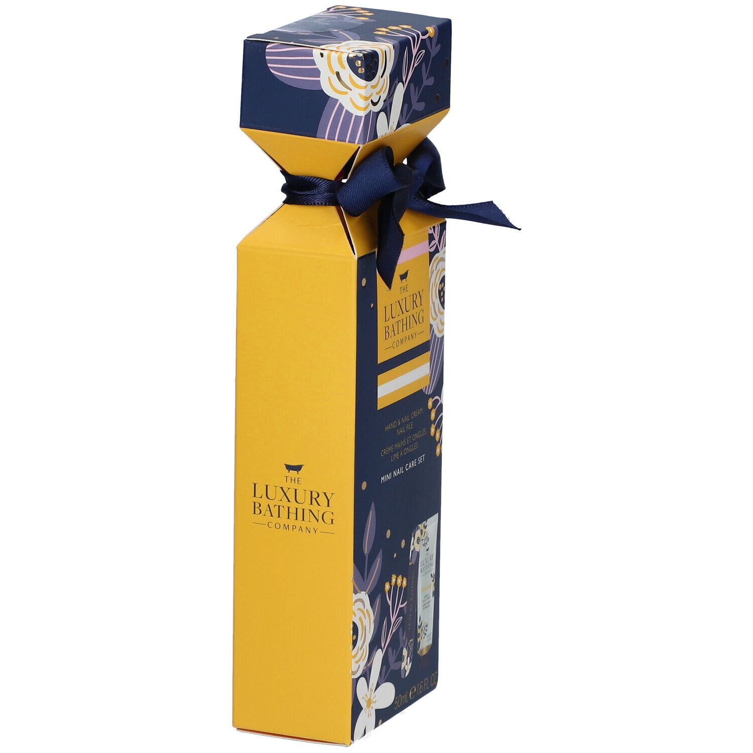 Gelbe Geschenkbox mit blauem Band. Aufdruck: The Luxury Bathing Company. Blumenmuster. Mini-Nagelpflege-Set.