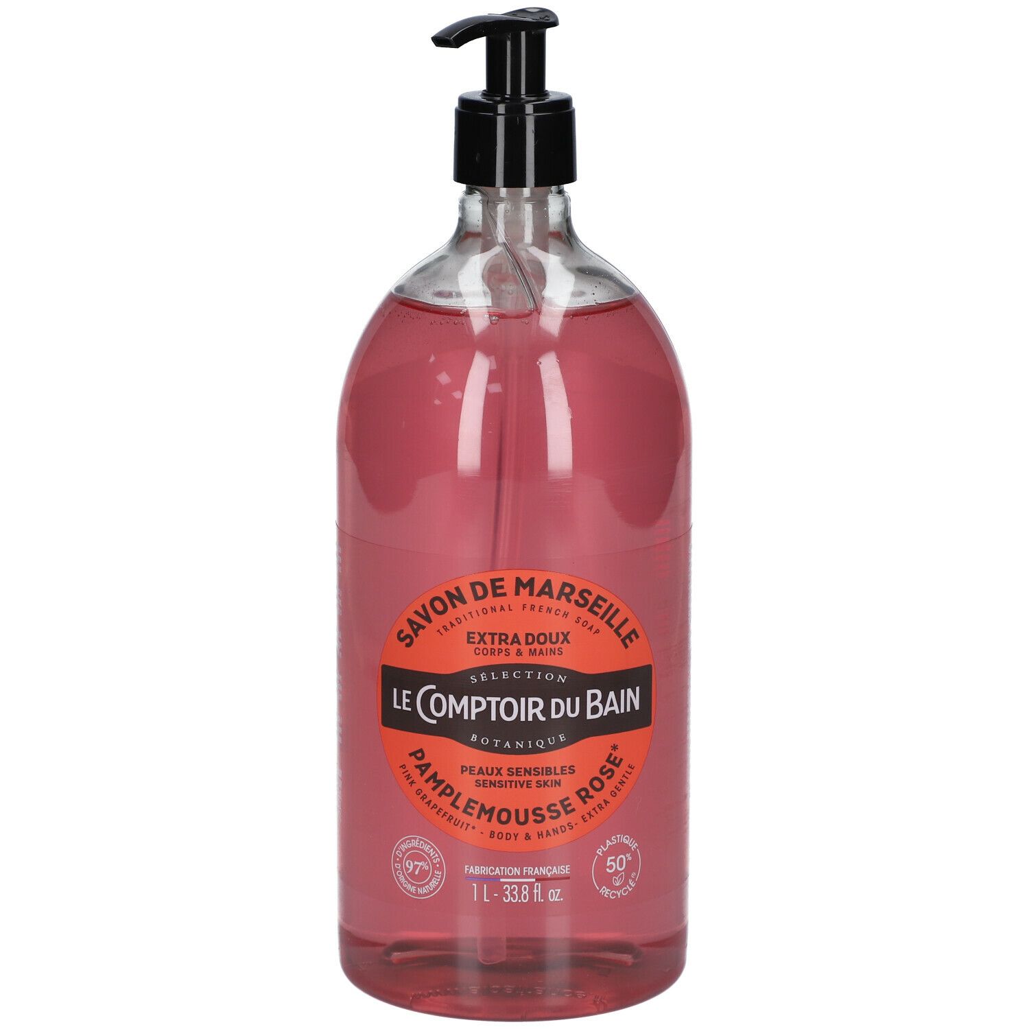 Transparente Flasche mit rosa Flüssigseife und schwarzem Pumpspender. Etikett mit Produktinformationen.