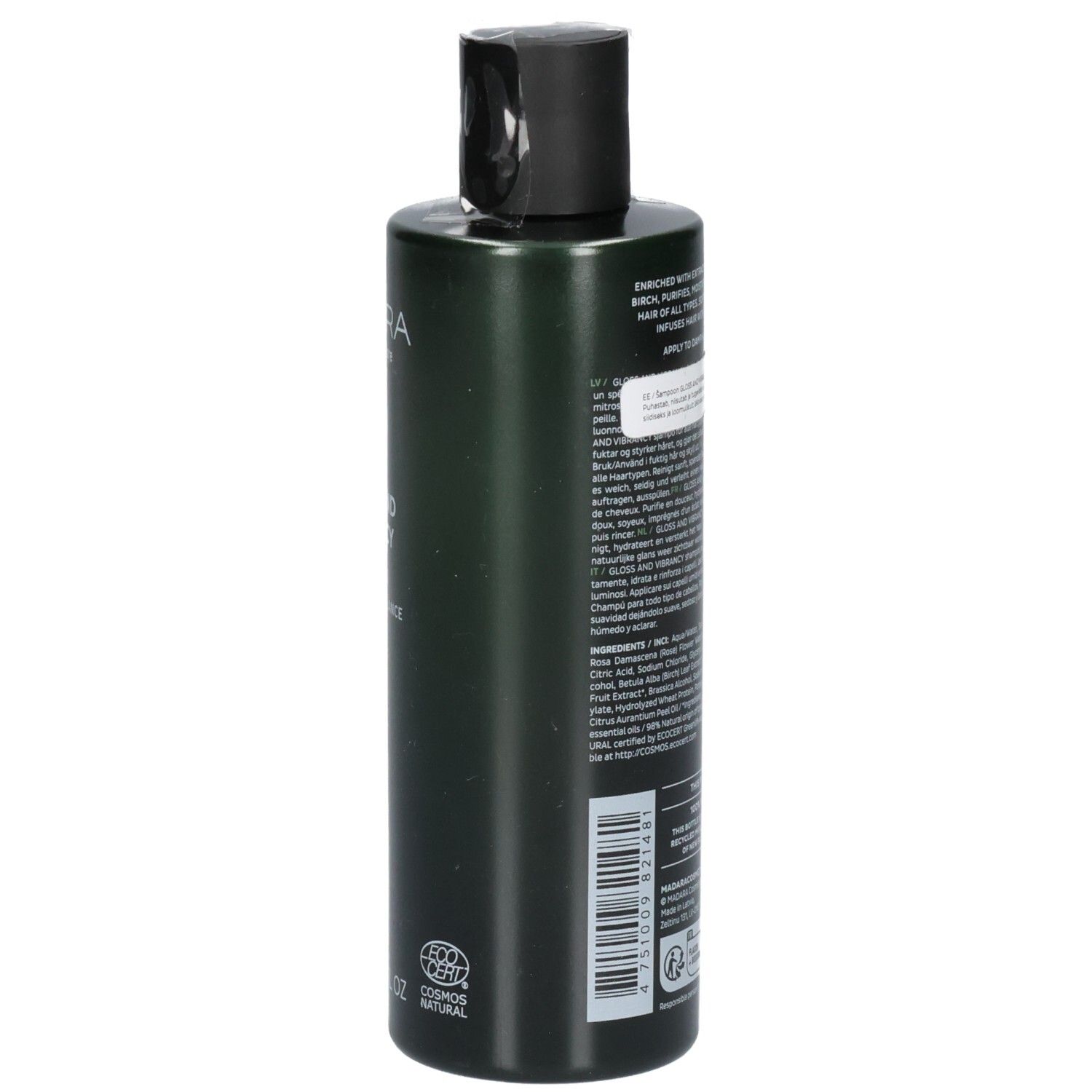 Rückseite einer grünen Shampoo-Flasche. Beschriftung enthält Inhaltsstoffe und Anwendungshinweise.