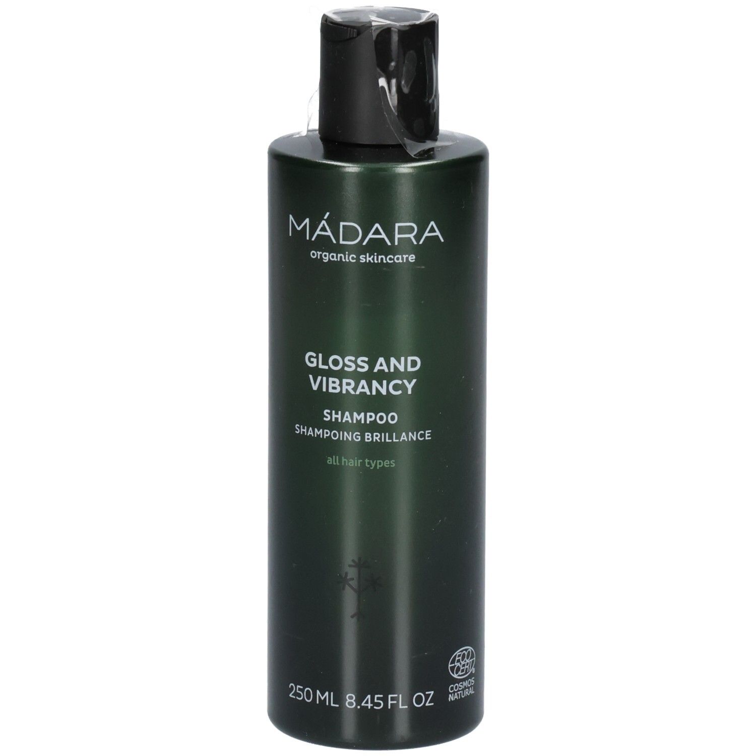 Grüne Shampoo-Flasche mit schwarzem Deckel. Beschriftung: MÁDARA, Gloss and Vibrancy Shampoo, 250 ml.