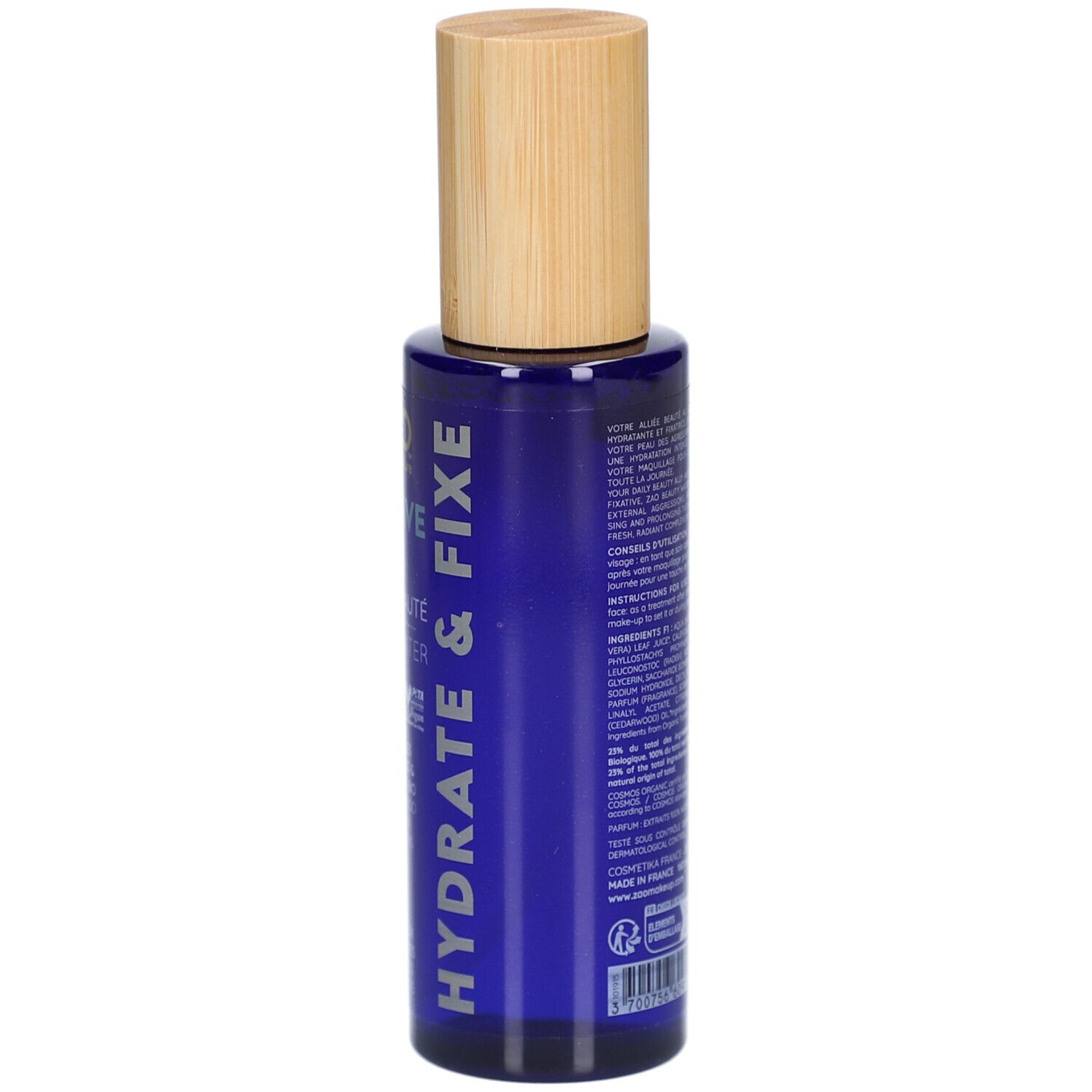 Rückseite einer blauen Flasche mit Holzdeckel. Text: Inhaltsstoffe, Anwendungshinweise, Herstellerinformationen.