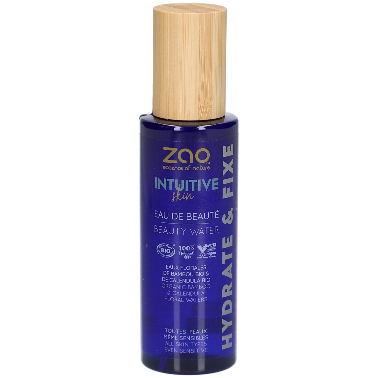 Blaue Flasche mit Holzdeckel. Aufschrift: ZAO, Intuitive Skin, Eau de Beauté, Beauty Water. Hydrate & Fixe.