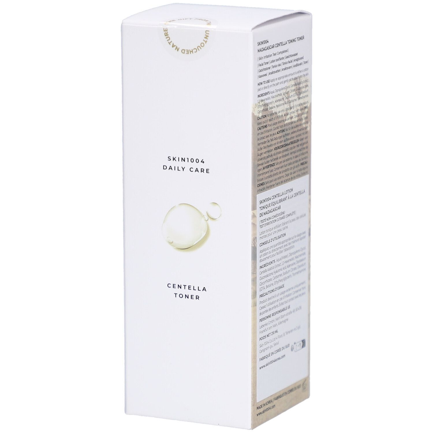 Weiße Produktverpackung mit Text und Abbildungen. Text: SKIN1004 DAILY CARE, CENTELLA TONER. Aufschrift: 210 ml / 7.10 fl.oz.