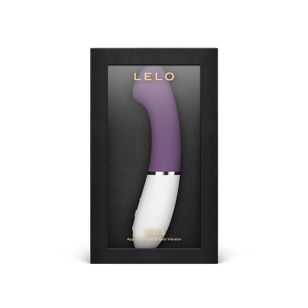 Vibrator in schwarzer Verpackung. Sichtfenster. Lila-weißer Vibrator. Marke Lelo.