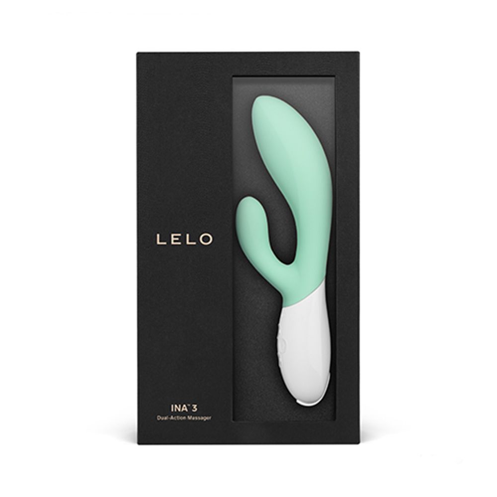 Schwarze Verpackung mit LELO-Logo und Produkt. Mintfarbener Vibrator im Fenster.