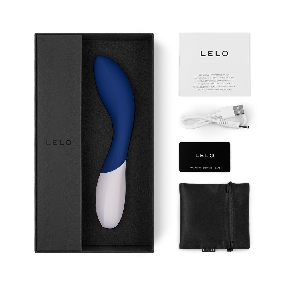 Vibrator, Zubehör und Verpackung. Enthält Ladekabel, Karte und Beutel. LELO-Logo.
