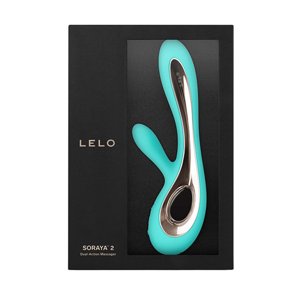 Schwarze Verpackung mit Sichtfenster. Türkisfarbener Vibrator mit goldfarbenen Akzenten. LELO-Logo.