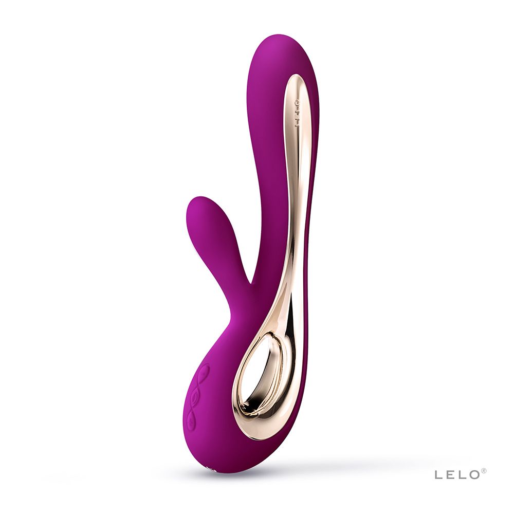 Lila Vibrator mit goldfarbenen Akzenten. Ergonomische Form mit zwei Stimulationspunkten. Marke: Lelo.