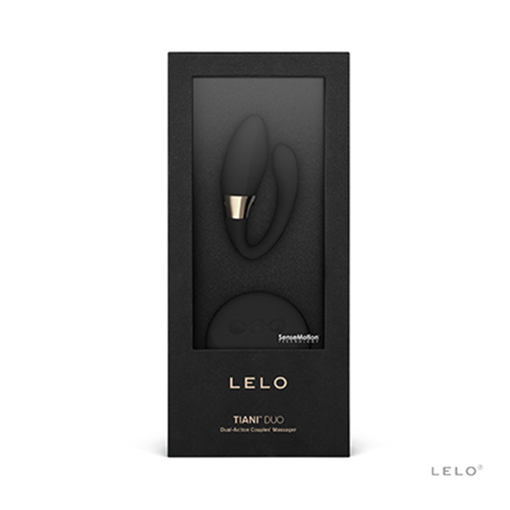 Verpackung des LELO Tiani Duo. Schwarze Schachtel mit Sichtfenster. Produkt und runde Basis sichtbar.