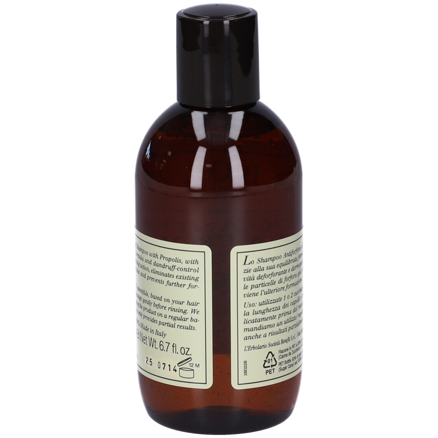 Braune Shampoo-Flasche mit schwarzem Deckel und Etikett mit Text und Pflanzenabbildung.