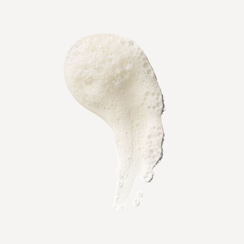 Nahaufnahme von Shampoo-Schaum. Weiße, schaumige Textur. Auf hellem Hintergrund.