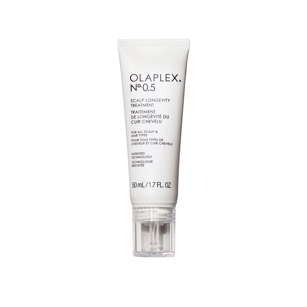Olaplex N°.0.5 Scalp Longevity Treatment. Weiße Tube mit transparentem Applikator. Produktinformationen und Marke aufgedruckt.
