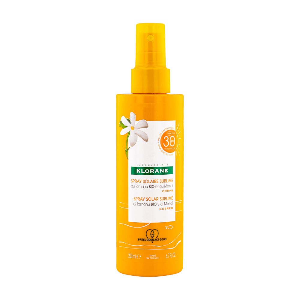 Gelbe Sprühflasche mit Sonnencreme. Aufschrift: KLORANE, Spray Solaire Sublime LSF 30. Mit Monoi und Tamanu Bio.