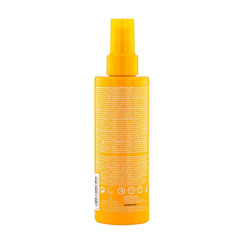 Gelbe Sprayflasche mit Sprühkopf. Rückseite mit Text und Logos. Aufschrift: www.klorane.com.