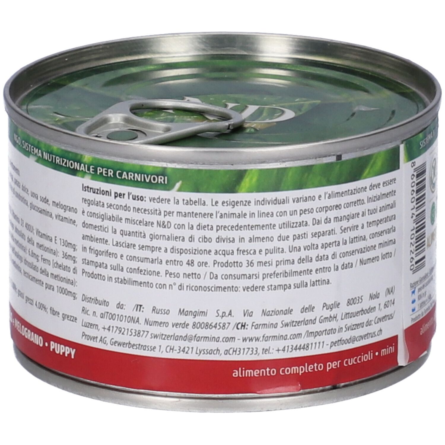 Hundefutterdose. Rückseite mit Anweisungen und Text. Text: Istruzioni per l'uso. Alimento completo per cuccioli mini.