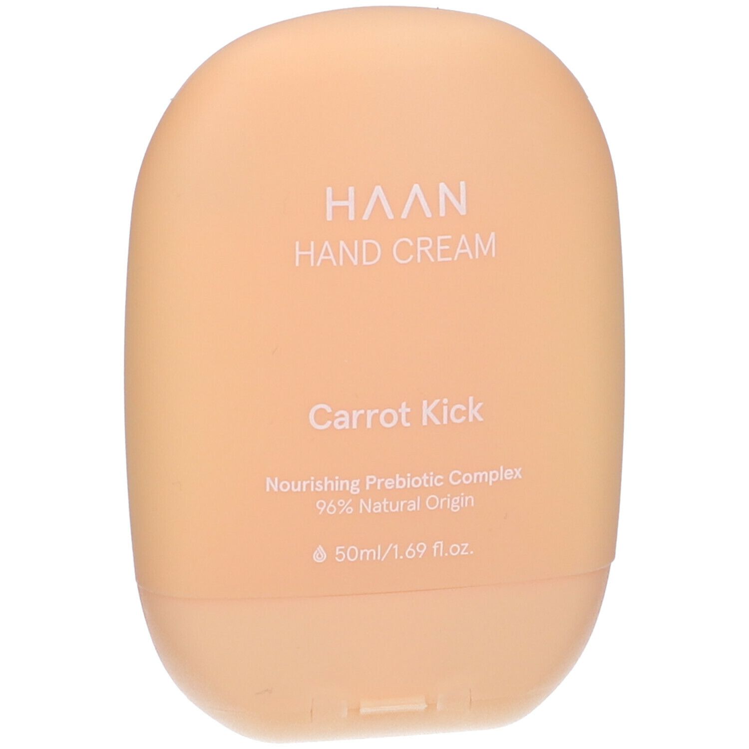 Beige Handcreme-Tube. Aufschrift: HAAN, Hand Cream, Carrot Kick. Enthält 96% natürliche Inhaltsstoffe.