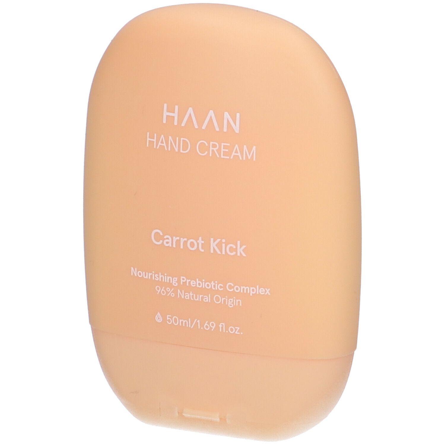 Beige Handcreme-Tube. Aufschrift: HAAN, Hand Cream, Carrot Kick. Enthält 96% natürliche Inhaltsstoffe.