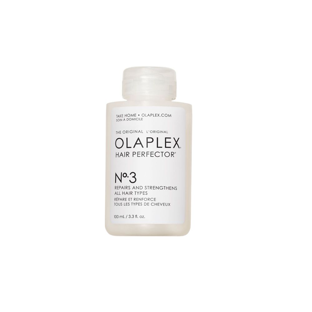 Olaplex No. 3 Hair Perfector Flasche. Weißes, rechteckiges Gefäß mit weißem Deckel. Text: Olaplex, No. 3, 100 ml.