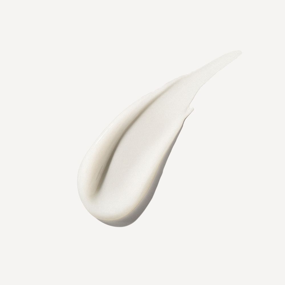 Auslauf von Haarprodukt. Weiße, cremige Textur. Glatte, geschwungene Form. Auf hellem Hintergrund.