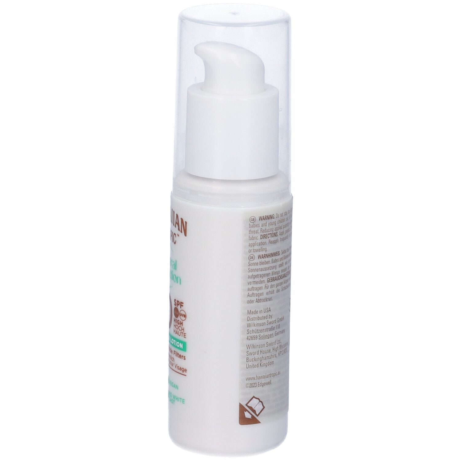 Weiße Flasche mit Pumpverschluss. Aufschrift: Hawaiian Tropic, Mineral Protection, 30 SPF, Facial Milk Lotion. Vegan.
