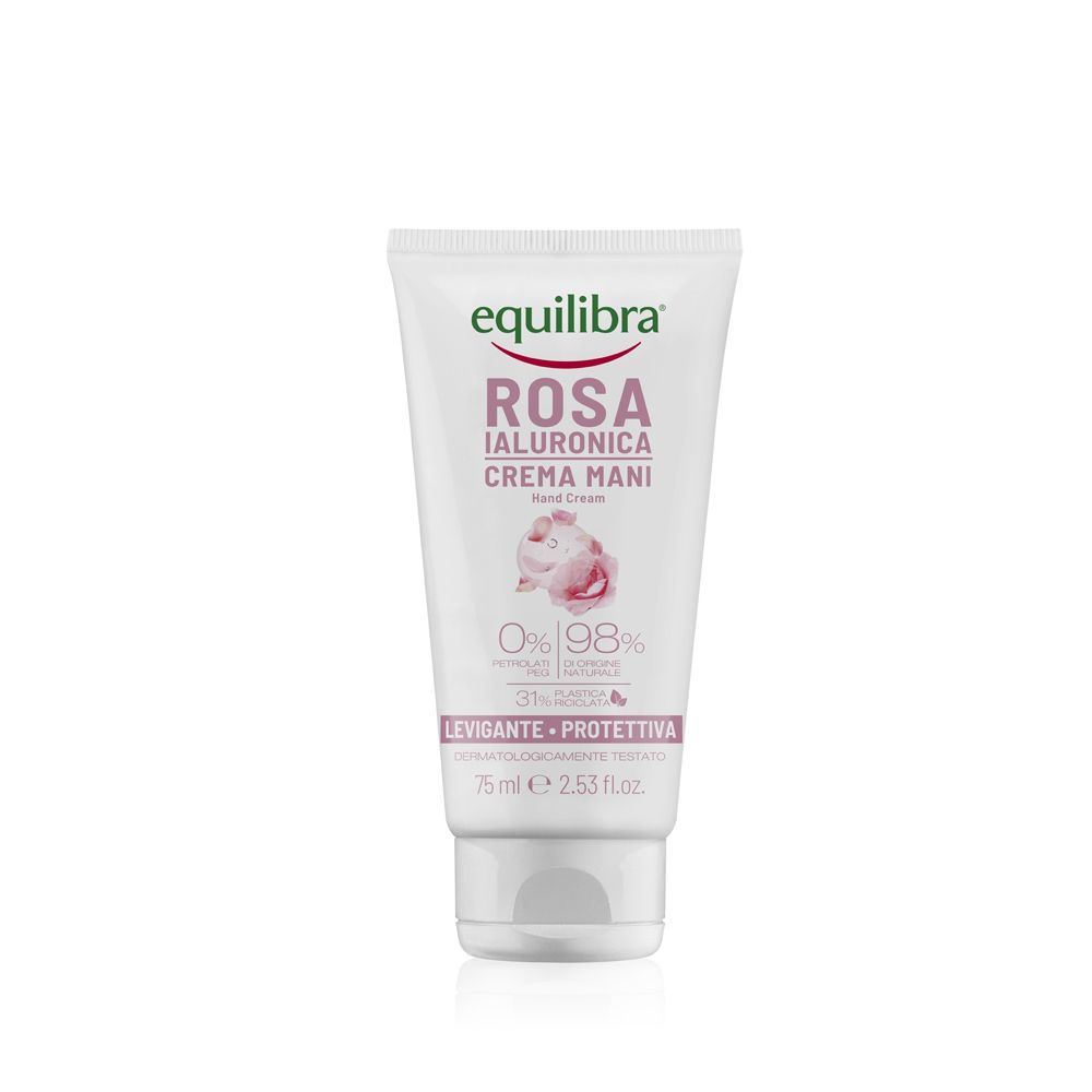 Creme-Tube Equilibra Rosa Ialuronica Crema Mani. Weiß, mit rosa Schrift und Blütenabbildung. 75 ml.