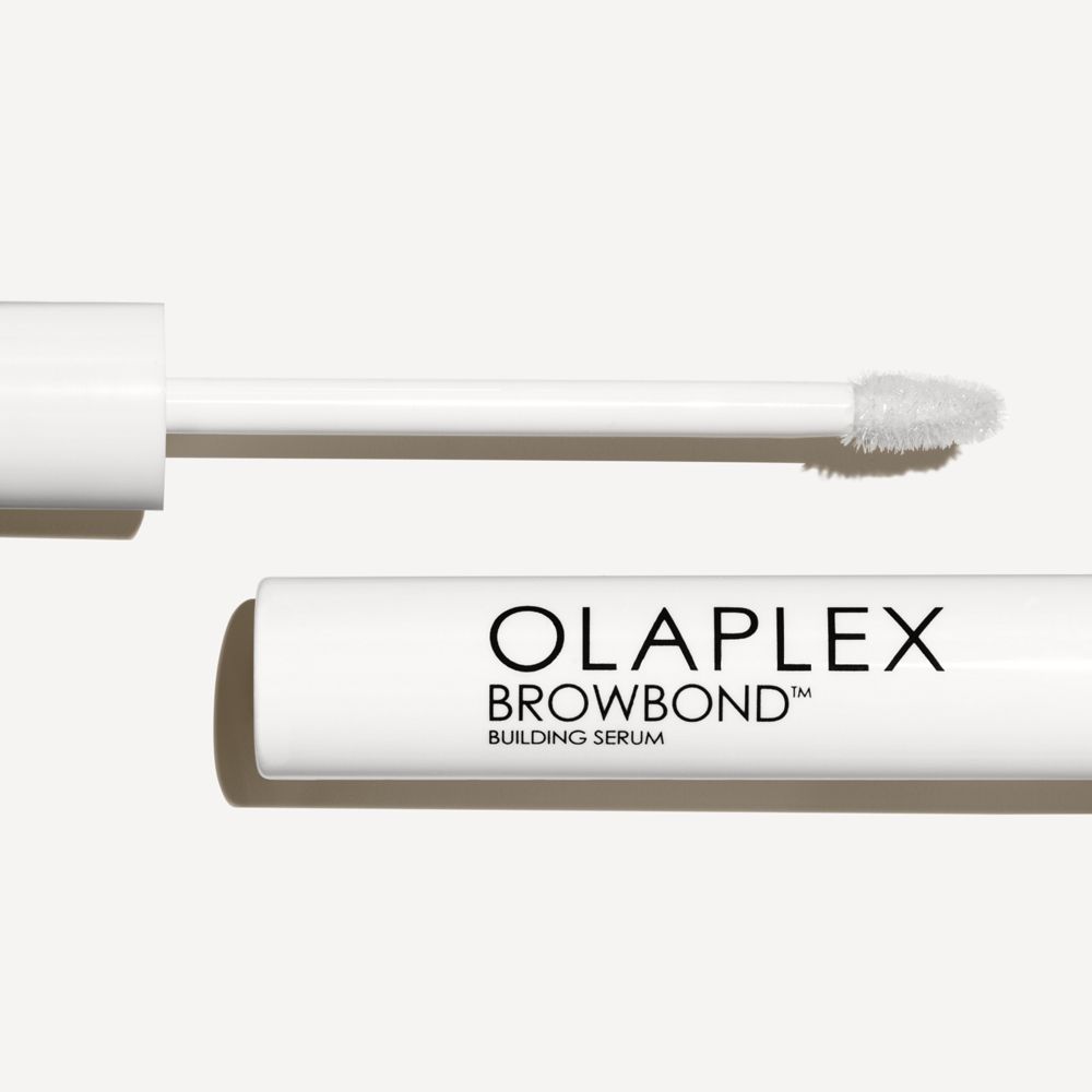 Olaplex BROWBOND™ Building Serum. Flasche und Applikator. Produktname und Marke sind sichtbar.