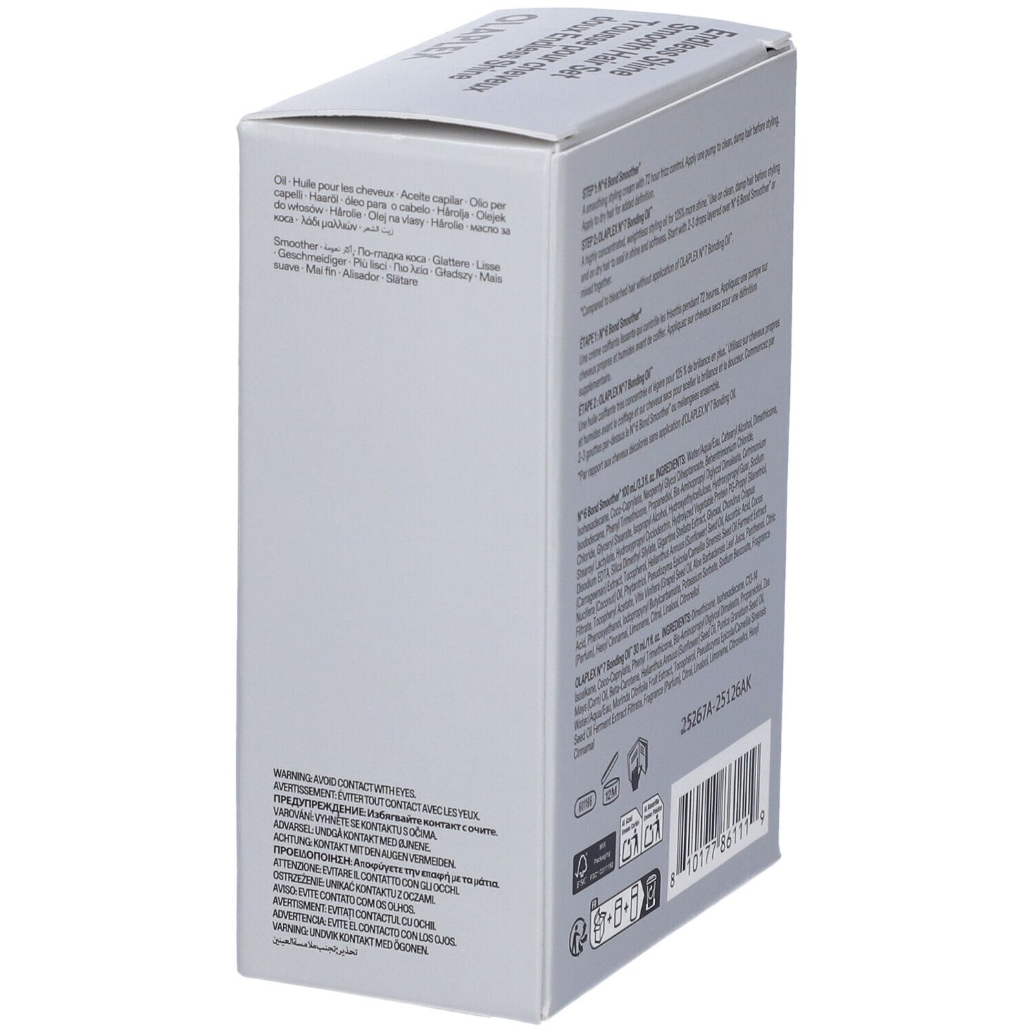 Graue Verpackung für Haaröl mit mehrsprachigen Produktinformationen und Barcode.